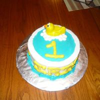 1St Birthday Cake The duck is rolled buttercream..I love working with it tastes much better than fondant...