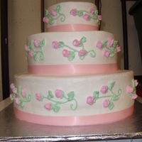 Rose Bud 14 in, 10 in, 6 in cake w/ light pink rose buds...my second wedding cake, I was pleased with it