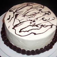 Sweet Heaven Bailey's Irish Cream cake w/white chocolate ganache butter cream (w/hint of Bailey's) and dark chocolate ganache accents