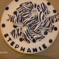 Steph's Cake WASC with white chocolate buttercream. fondant accents, edible image zebra sheets