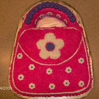 Maddie's Cake Strawberry cake with buttercream and fondant accents