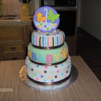 Tiny Bundle Cake I made this for my daughter's baby shower. Used the invitation and napkin for inspiration!