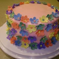 101 Flowers Made this cake for my MIL birthday. WASC cake filled with raspberry jam, buttercream frosting and covered in MMF. Flowers made with...