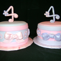 Twin Girls 4Th Birthday Made for my daughter's 4th birthday. One white one chocolate cake 6 inch. Both covered in MFF with gumpaste accents. 4 on top is...