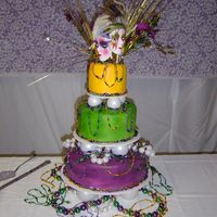 Mardi Gras Wedding Cake This was done for my sons mother in law. They were married on Fat Tuesday 2005. It was a wild wedding and an event wilder reception. The...