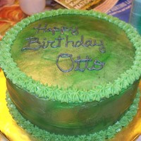Camo very first camo cake. wilton moss green with black, green and gold spray to give camo effect