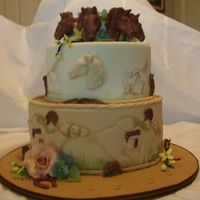 State Fair Entry - Horse Theme This is a dummy cake for the state fair. pastillage horse heads, gumpaste flowers., fondant covered