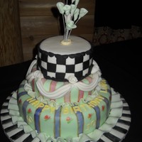 50Th Birthday Cake Tiered red velvet cake, cream cheese filling, fondant covered birthday cake for a beautiful lady turning 50. Fondant and gumpaste accents...