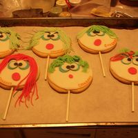 Crazees Cookies Just for fun for a local event in a very small town. sugar cookies baked on a stick, apricot glazed in fondant decor.