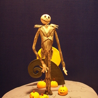 Jack Skellington Birthday Cake Jack and his landscape all in gumpaste on a fondant covered red velvet cake (always from scratch ) with a cream cheese filling. Handpainted...