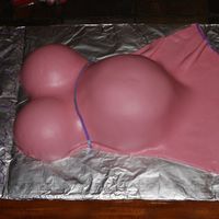 Luda_Baby_Shover_059.jpg This is my first belly cake that I have ever made. Cake came out not very perfect, but it was a huge surprise for everyone especially the...