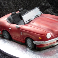 3D Triumph Spitfire I made this for my dad's 60th birthday last week... he has bought himself a Triumph Spitfire thats in pieces to restore so this cake...