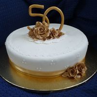50Th Wedding Anniversary I was so proud of my monogram that i made myself. I first of all painted it with antique gold cake paint but wasnt right didnt match the...