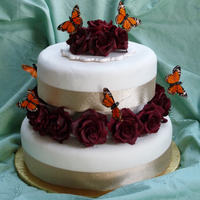 50Th Anniversary Monarch Cake this was done for a couple celebrating their 50th anniversary. He loves roses she loves butterflies. the butterflies were supplied and are...