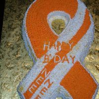 Orange And White Tenesha Birthday cake.
