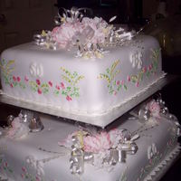 60Th Anniversary Cake mother and father in law gor married during WW2 and had no wedding cake or flowers.this was my attempt of a replacement wedding cake which...