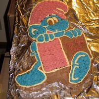 Wilton Smurf Character Cake Coloring icing is hard! This is my first iced cake, decorated May 18, 2009 as part of the Wilton class. I couldn't get a good red! I...
