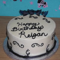 Black And White strawberry cake with almond buttercream frosting.