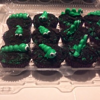 Worms Chocolate cupcake, oreo crumbs and fondant worms dusted with green disco dust!!