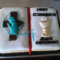 Firstcommunion3Dbiblecake.jpg Opened Bible cake covered with marshmellow fondant and decorations made with chocolate candy.