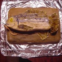 Fish Cake this was another first for me, i hand "painted" the colors on it. turned out pretty good and the client loved it.