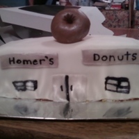 Donut Shop Cake My son designed and decorated this for a cub scout cake auction. It sold for 20$ and was the highest priced cake that night.