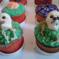 Cupcakes For Halloween These were made using 3-D skulls made out of white chocolate.