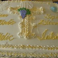 Catholic Initiation This cake represents the Initiation into the Catholic Church. It symbolizes Baptism (Shell & Water); First Communion (the Host); and...