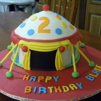 Circus Tent 10in chocolate cake with chocolate ganache, top is 9in caramel mud cake with white chocolate ganache.