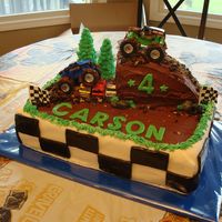 Monster Truck I made this cake for my son's 4th birthday. Cake is covered in Chocolate Buttercream with MMF checkerboard sides and accents. Monster...