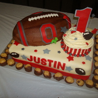 Ohio State First Birthday OSU Football cake with giant cupcake "smash cake" for my nephew's first birthday party. Football is chocolate buttercream...