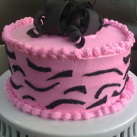 Hot Pink And Zebra Hot Pink buttercream with fondant accents