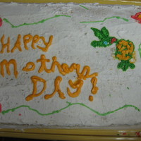 "happy Mothers Day" my vary first cake that i made for a class. it was close to mothers day so i decided to do a mothers day cake with a humming bird at an...