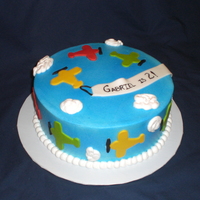 Airplane Cake Chocolate cake, vanilla buttercream and handcut vanilla fondant decorations.