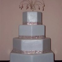 Lavender Bling Hexagon with lavender MMF and aurelia borealis crystal cake jewelry fountain with silver/holographic ribbon.