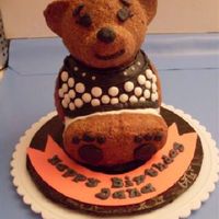 Build A Bear For Jana Chocolate pound cake with buttercream icing base covered with demerara sugar for fur. Buttercream clothes to match little girl's...