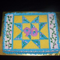 Quilt Cake 1/2 vanilla and 1/2 chocolate cake. All buttercream icing with fondant #90.