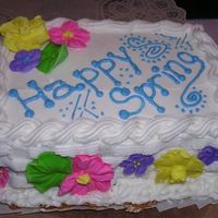 Happy Spring a little cake I made for my grandma with buttercream icing and royal icing flowers.