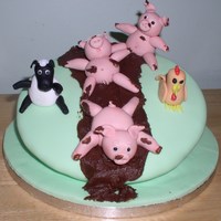 Wonky Cake Here is the first wonky cake that I have done. Did it at a workshop today and then decorated it with the animals. Fab day and learnt loads...