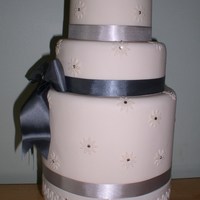 Daisy Wedding Cake This is a dummy cake so the gems on it are from papercraft. There will be a matching cutting cake for this where i will just leave the gems...