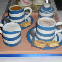 Tray Of Tea I made this for a mini cake competition. Everything bar the cake board is made from fondant and edible. The mini cakes were marzipanned...