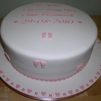Christening A 12" sponge on a 16" board. Footprints were purchased culpit ones, My first attempt at ribbon insertion.