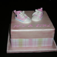 Baby Converse Shoes are made with gumpaste using pattern in template gallery. 8"x8" 2-layer square cake airbrushed with pink sheen color. A...