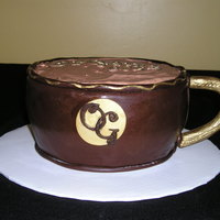 Coffee Mug This is an 8" round cake carved to resemble a coffee cup. I covered the sides with chocolate fondant and used whipped chocolate...
