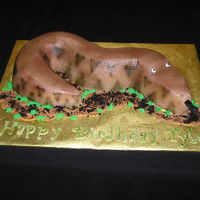 Snake Cake One Bundt cake cut into quarters. I used the leftover cake from when I leveled the cake to form the head and the tail. I iced with...