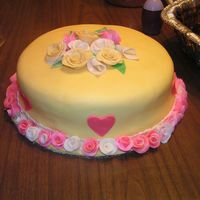 Pict0045.jpg Mother's Day Cake. My 1st fondant cake/ gumpaste decorations...my husband baked the cake, made the frosting LOL...he's wonderful...