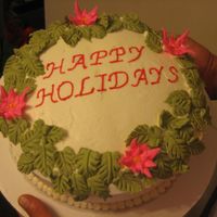 Img_1106.jpg This was a cake out of a Wilton book, I made it for a Christmas party. All BC except pointsettas, and holly leaves were royal icing. This...