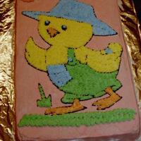 Carlee's Duck Cake All buttercream. Trick learned in course one; tracing image onto wax paper, outlining with piping gel, transferring onto cake, then filling...