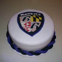 Fondant Baltimore Ravens Cake Marshmallow fondant on the cake and the shield logo and the border was made with gumpaste. This is my first fondant cake