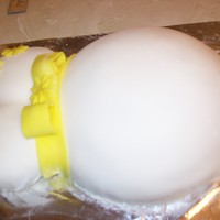 Preggers Belly Cake My first belly cake and my first cake to be covered completely in fondant. Not as good as some on CC, but I got a lot of good advice from...
